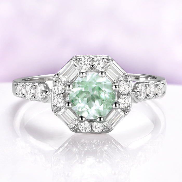 Vintage Octagon Halo Green Amethyst Ring in Sterling Silver by Aquamarise, featuring a 0.85 carat green amethyst center with baguette and round simulated diamond accents in a vintage halo design.