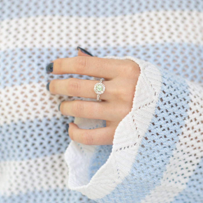 Hexagon Green Amethyst Ring- Sterling Silver by Aquamarise, featuring a natural green amethyst center with a halo of simulated diamonds on a rhodium-finished sterling silver band.