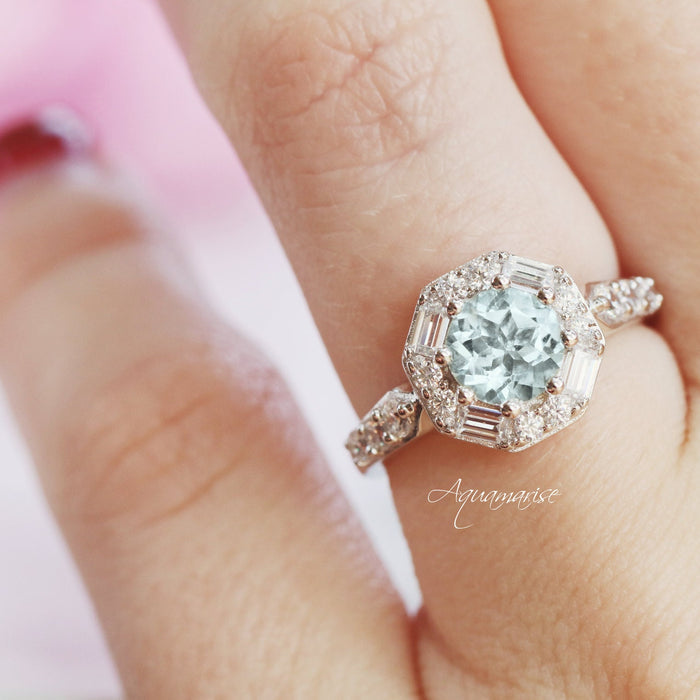 Hexagon Aquamarine Ring- Sterling Silver by Aquamarise featuring a natural blue aquamarine center with baguette and simulated diamond accents on a polished sterling silver band.