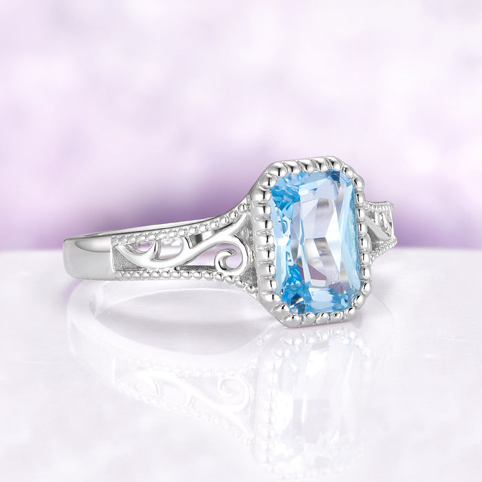 Radiant Cut Sky Blue Topaz Ring, Sterling Silver Vintage Halo Engagement Ring, December Birthstone Ring