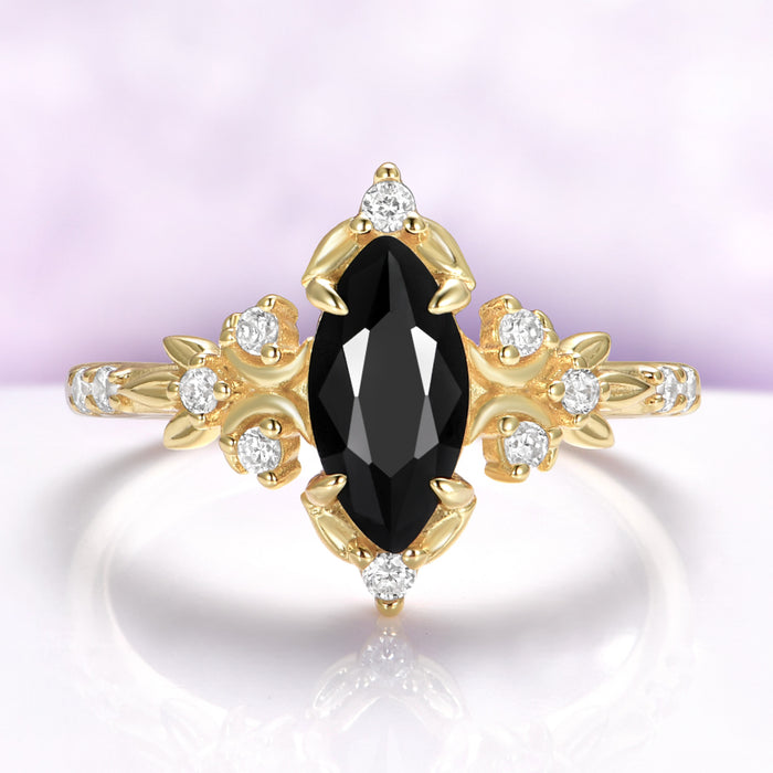 Marquise black onyx engagement ring in 14K yellow gold vermeil with crescent moons and leaf shoulders