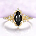 Marquise black onyx engagement ring in 14K yellow gold vermeil with crescent moons and leaf shoulders