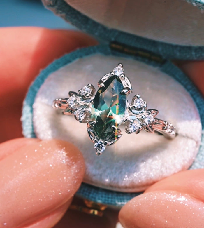 Viridian Marquise Green Tourmaline Engagement Ring in Sterling Silver by Aquamarise, presented in a teal velvet ring box.