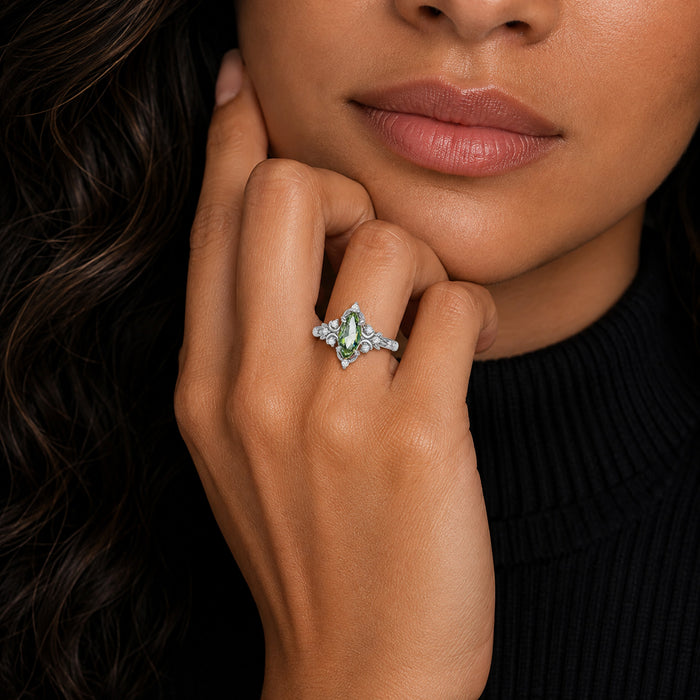 Viridian Marquise Green Tourmaline Engagement Ring by Aquamarise, worn on the hand to show the marquise green tourmaline in daylight.