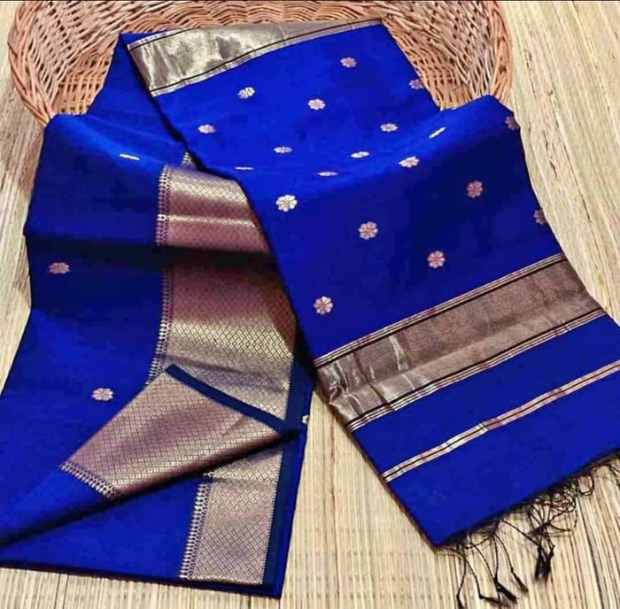 Vivid blue Maheshwari silk saree with metallic gold buti across the body and wide decorative borders, handwoven in Maheshwar