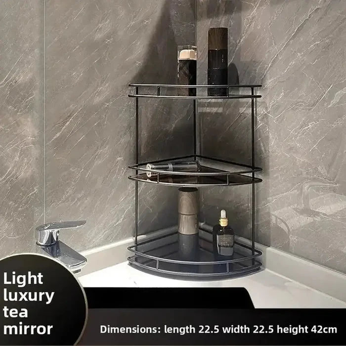 Black wall-mounted bathroom corner shelf showcasing tea and toiletries in a luxurious design.