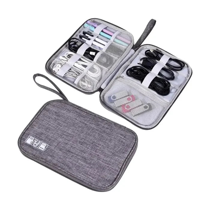 Waterproof electronics organizer bag holding various cords and chargers.