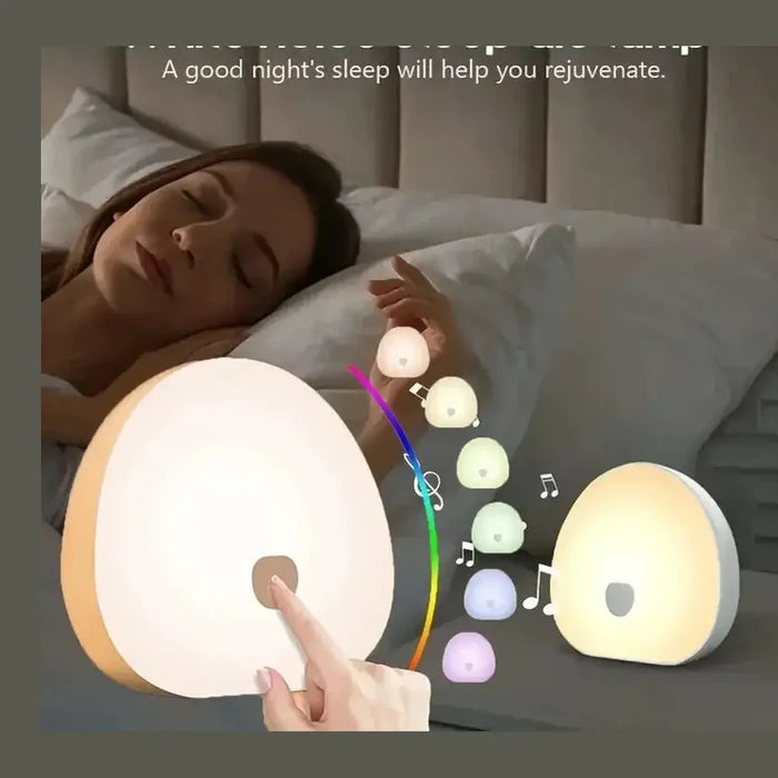 Woman using a white noise night light for sleep, showcasing 7 colors and soothing sounds to enhance relaxation.