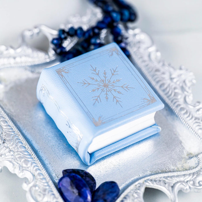 Winter Court Leather Book Ring Box – Frost Sky Edition (Small) by Aquamarise, a delicate blue leather ring box inspired by winter, perfect for unique engagement and promise rings.