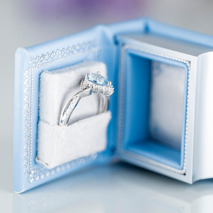 Winter Court Leather Book Ring Box – Glacier Mist Edition (Small) by Aquamarise, a handmade, elegant blue leather keepsake box for unique engagement or promise rings.