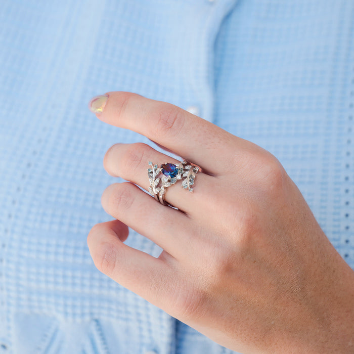 Wisteria Alexandrite Leaf Couples Ring Set by Aquamarise featuring a pair of delicate rings with lab-grown alexandrite gemstones and nature-inspired leaf details, part of Matching Couples' Rings and June Birthstone Jewelry collections.