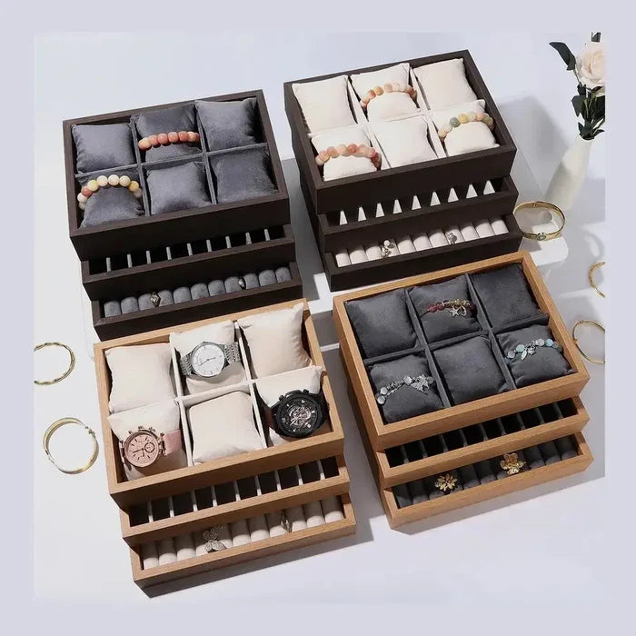 Wooden velvet jewelry tray organizer with compartments for rings, watches, and bracelets in various colors.